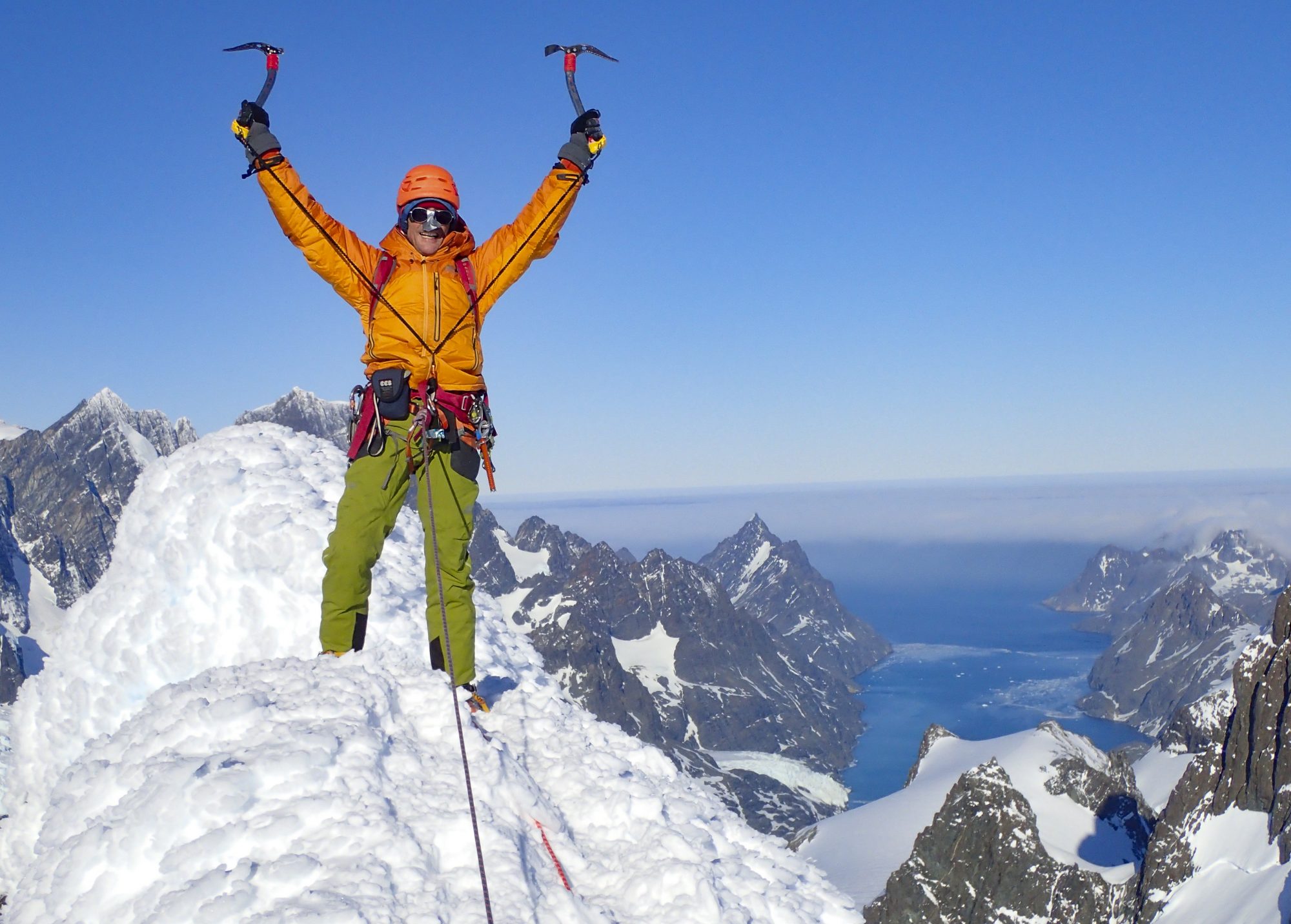 Stephen Venables on a snow covered mountain peak