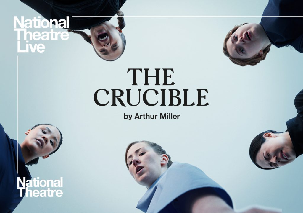 5 women looking down to the ground toward the camera with 'The Crucible' written in the middle