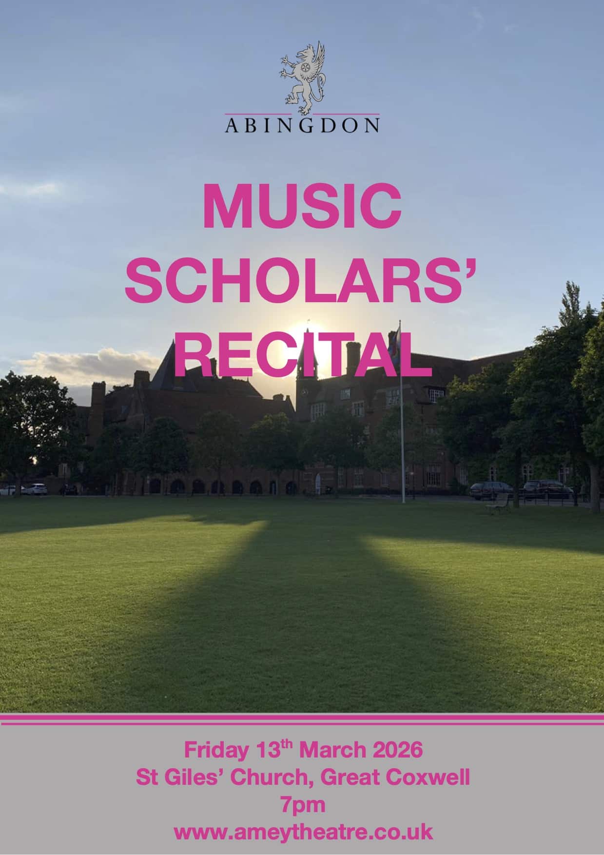 Old school building with the sun setting